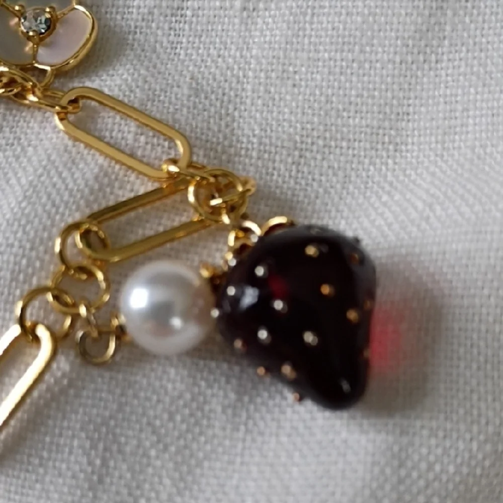 kate spade Gold Charm Bracelet with Red Strawberry Charms and Pearl Accents - Picture 4 of 5